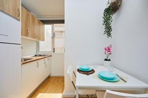 A kitchen or kitchenette at El Sueño De Alejandra - Apartments