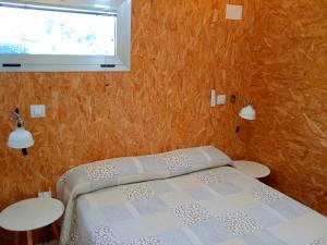 Postel nebo postele na pokoji v ubytování El Vagón de Baides