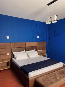 Postel nebo postele na pokoji v ubytování Divjaka Resort