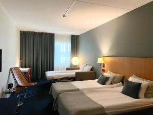 Letto o letti in una camera di Quality Hotel Globe