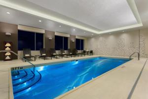 a large swimming pool in a hotel room at Hyatt Place Chicago/Downtown - The Loop in Chicago