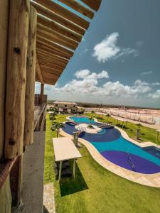 Una vista de la alberca en CANOA - Boas Vistas o alrededores