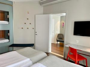 Letto o letti in una camera di Quality Hotel Globe