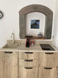 a kitchen with a sink and a counter top at casa Tuccari Castiglione di Sicilia in Castiglione di Sicilia