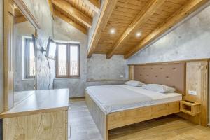 Postel nebo postele na pokoji v ubytování Casa Viktor