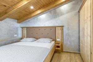 Postel nebo postele na pokoji v ubytování Casa Viktor