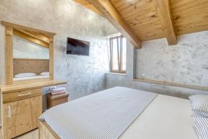 Postel nebo postele na pokoji v ubytování Casa Viktor