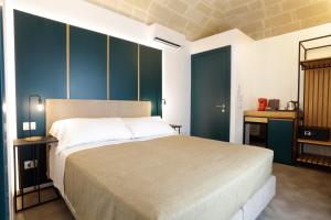 Łóżko lub łóżka w pokoju w obiekcie Mazzini Accommodation