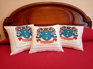 a bed with two pillows on top of it at B&B BORGHI in Poppi