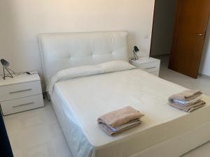 Een bed of bedden in een kamer bij Casa Varazze