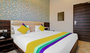 Postel nebo postele na pokoji v ubytování Itsy Hotels Jashan