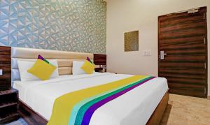 Postel nebo postele na pokoji v ubytování Itsy Hotels Jashan