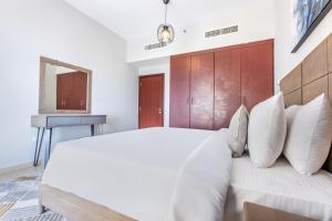 Cama o camas de una habitación en Icon Casa Living - Rimal 3 Residence - JBR