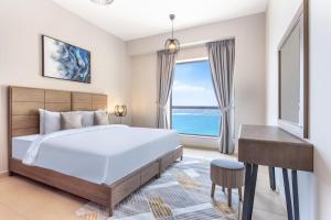 Cama o camas de una habitación en Icon Casa Living - Rimal 3 Residence - JBR