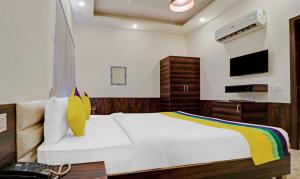 Postel nebo postele na pokoji v ubytování Itsy Hotels Jashan
