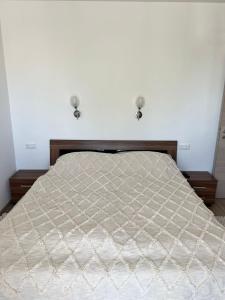 Posteľ alebo postele v izbe v ubytovaní Edmond Apartment