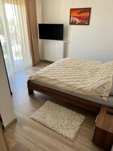 Posteľ alebo postele v izbe v ubytovaní Edmond Apartment