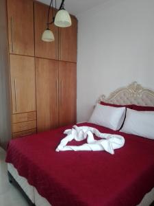 Postel nebo postele na pokoji v ubytování Precious Apartment