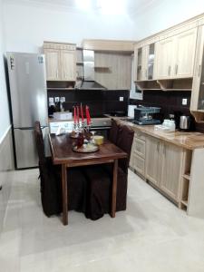 Kuchyň nebo kuchyňský kout v ubytování Precious Apartment
