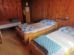 Un ou plusieurs lits dans un hébergement de l'établissement Great Mountain B&B Platak