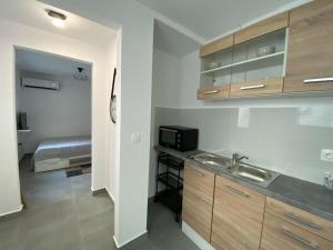 Kuchyň nebo kuchyňský kout v ubytování Tiny Little House