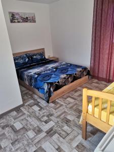 Postel nebo postele na pokoji v ubytování Casa Andrei A + 37 fotografií