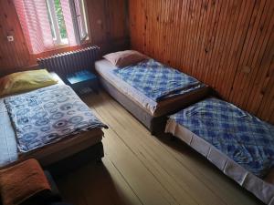 Un ou plusieurs lits dans un hébergement de l'établissement Great Mountain B&B Platak