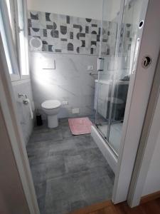 a bathroom with a shower and a toilet at Agriturismo Soleada in Ventimiglia