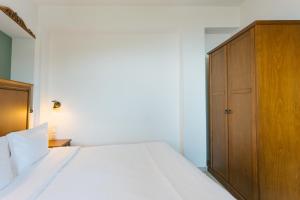 Postel nebo postele na pokoji v ubytování Archontiko Anemos