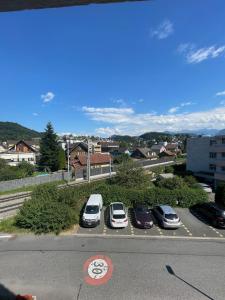 a group of cars parked in a parking lot at Silvia's Bed und Breakfast in Luzern in Lucerne