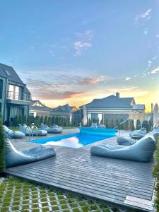 Πισίνα στο ή κοντά στο Cozy Vaivorykstes Apartment