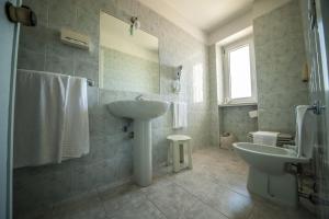Koupelna v ubytování Hotel Murano