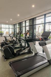 a row of cardio machines in a gym at Suasana Suite Cozy JB TOWN in Johor Bahru
