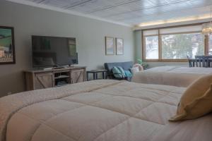 Ένα ή περισσότερα κρεβάτια σε δωμάτιο στο Tamarron Lodge Studio 232 +34 φωτογραφίες