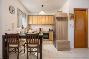 Cuisine ou kitchenette dans l'établissement Casa Callianeira Residence