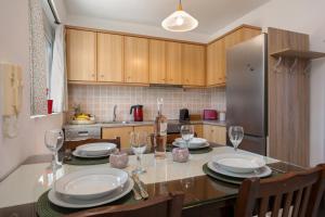 Cuisine ou kitchenette dans l'établissement Casa Callianeira Residence