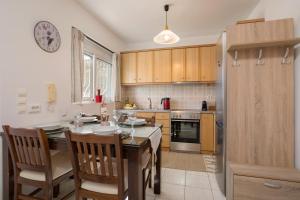 Cuisine ou kitchenette dans l'établissement Casa Callianeira Residence