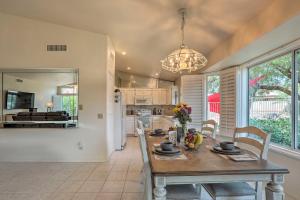 a kitchen and dining room with a table and chairs at Saddlebrooke Home with Private Pool and Amenities in Catalina