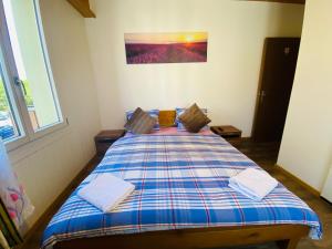 Postel nebo postele na pokoji v ubytování HOTEL CHRISTINA