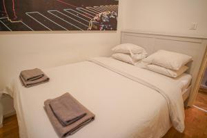 Postel nebo postele na pokoji v ubytování ComfortZone Zagreb center apartment