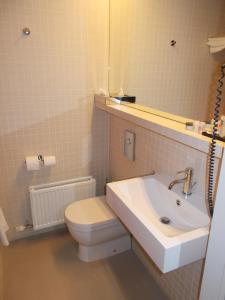 Koupelna v ubytování Hotel Corbie Lommel