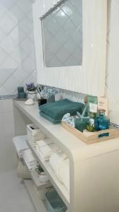 Koupelna v ubytování Un angolo di paradiso + 48 fotografií