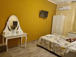 Postel nebo postele na pokoji v ubytování Rose Guest House