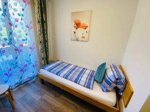 Postel nebo postele na pokoji v ubytování HOTEL CHRISTINA