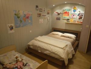 Llit o llits en una habitació de Chambres dans maison proches Nantes et Vallet