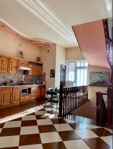 Kuchyň nebo kuchyňský kout v ubytování Doctor's House