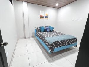 מיטה או מיטות בחדר ב-Tuareg Place Aeropuerto AC