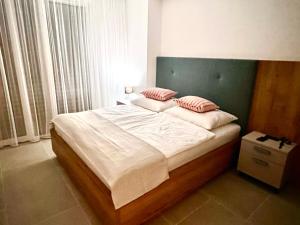 Postel nebo postele na pokoji v ubytování ZADAR Panorama Apartment