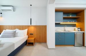 Olia Thassos - Luxury Apartments客房内的一张或多张床位