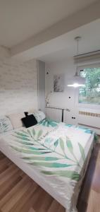 Postel nebo postele na pokoji v ubytování Sleep and drive Suites